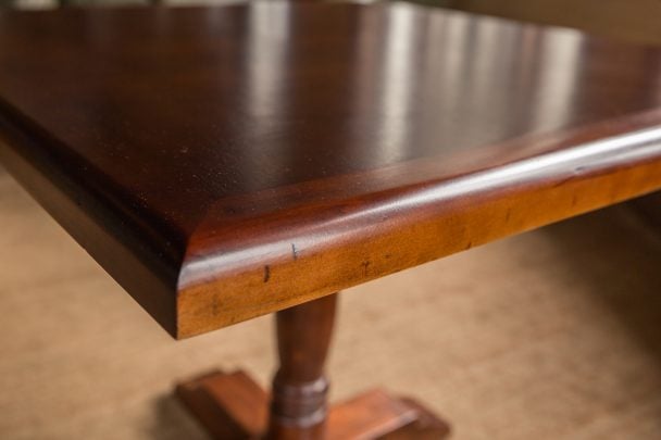 Closeup of brown table after restoration