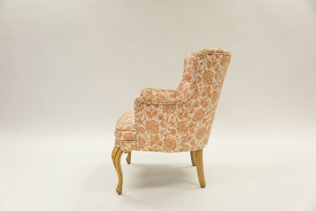 Floral chair before upholstery side view